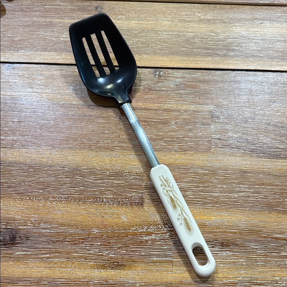 Vintage Black Slotted Spoon with White Wheat Designed Handle